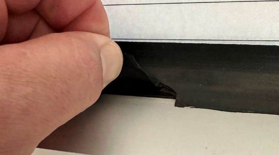 Sealant over the gasket — the “wet glaze” shortcut: Concave bead over the gasket, no bond to the frame.