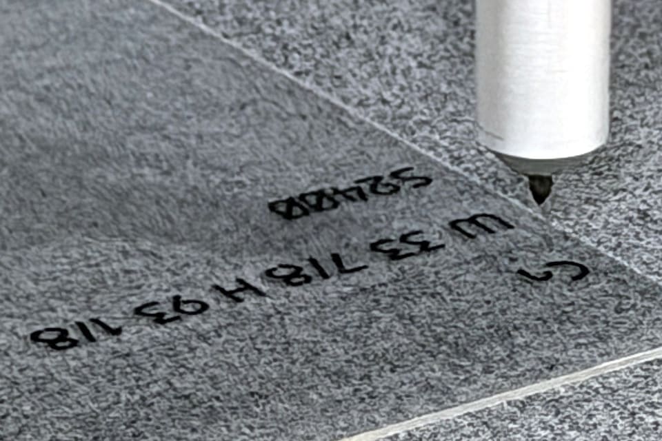 Cutting head over a 3M S2400 panel with the opening number and size scribed on the liner