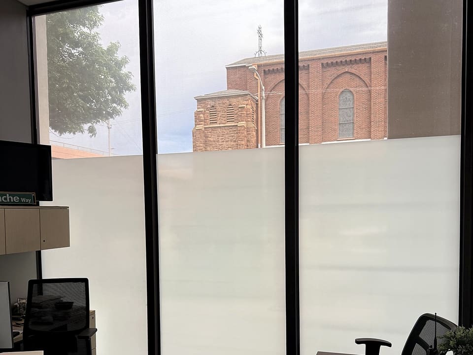 Finished office with a frost privacy band over 3M S2400 at screen height