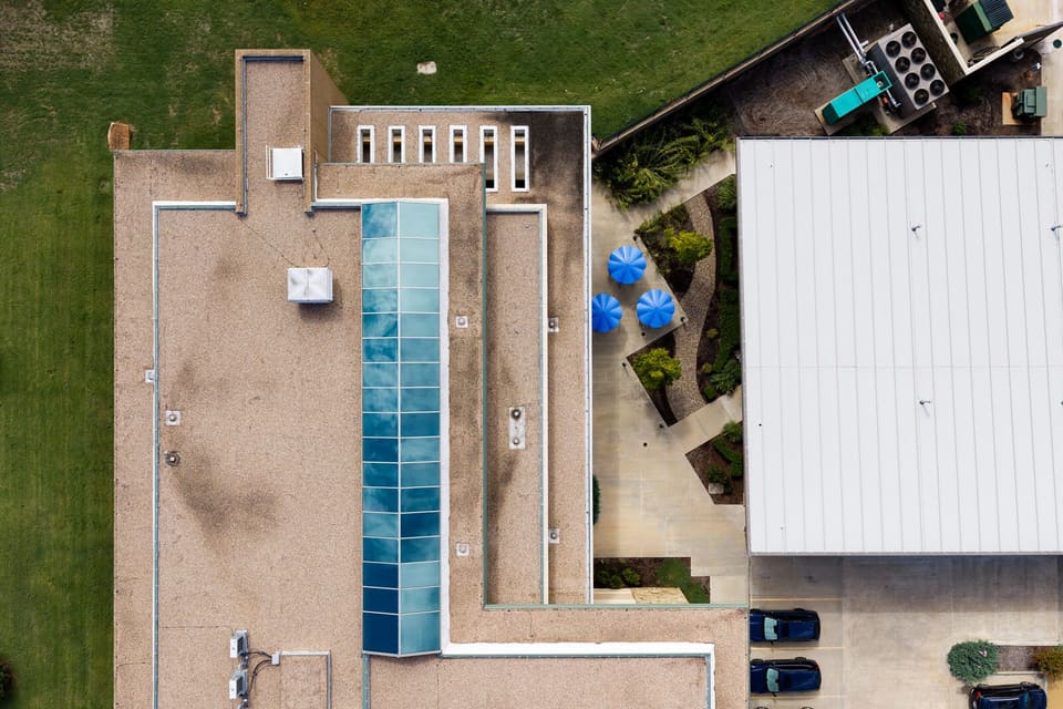 Completed skylight from above at the Oklahoma Department of Wildlife Conservation, with the courtyard beside it
