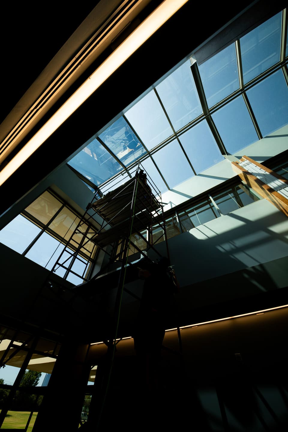 Epic crew working on the atrium glass and skylight at the Oklahoma Department of Wildlife Conservation during the film install