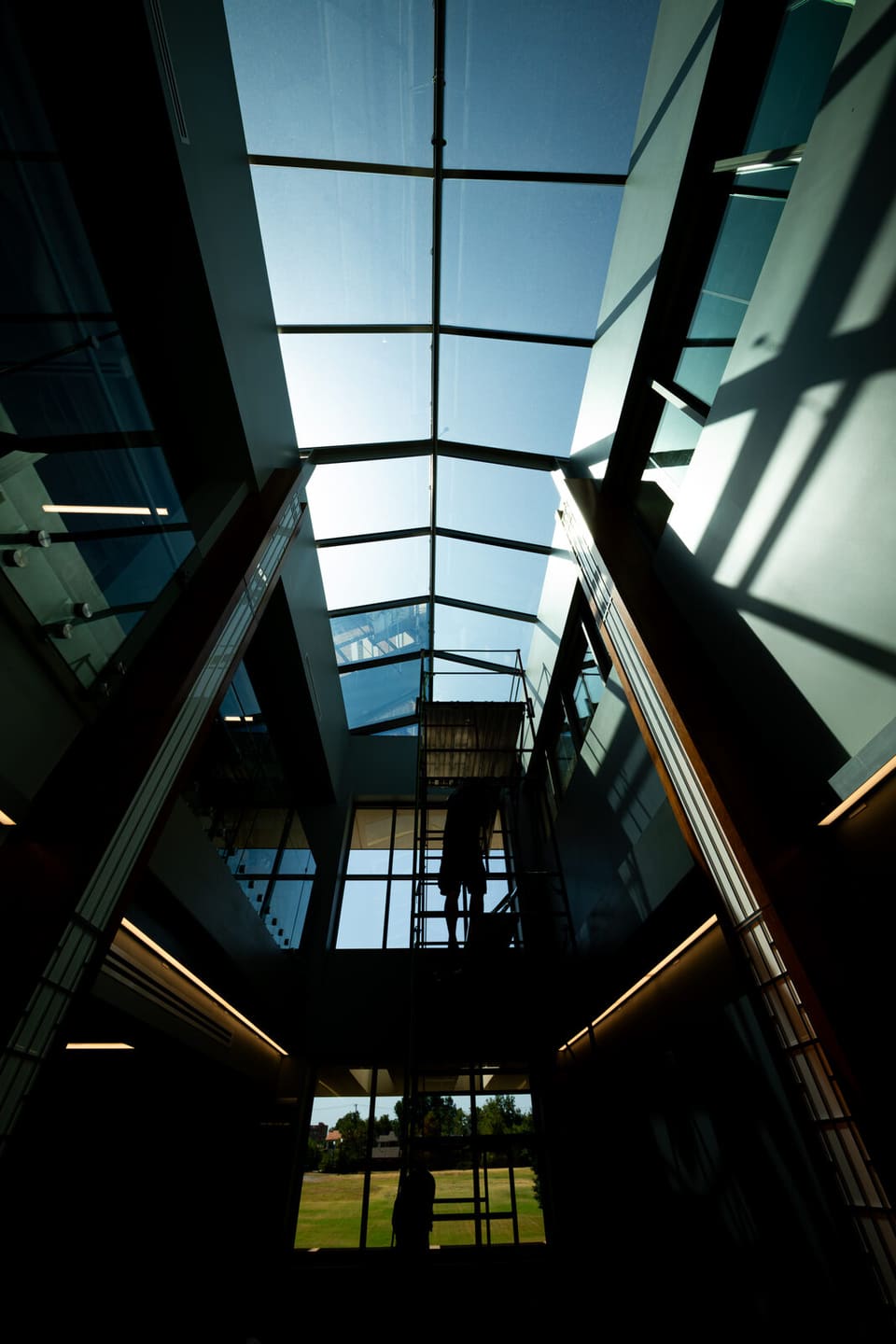 Epic crew working on the atrium glass and skylight at the Oklahoma Department of Wildlife Conservation during the film install