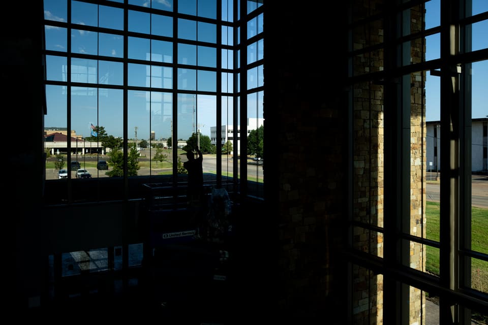 Epic crew working on the atrium glass and skylight at the Oklahoma Department of Wildlife Conservation during the film install