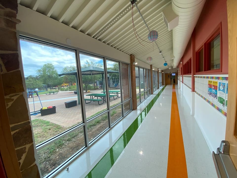 Finished school corridor glass with film installed