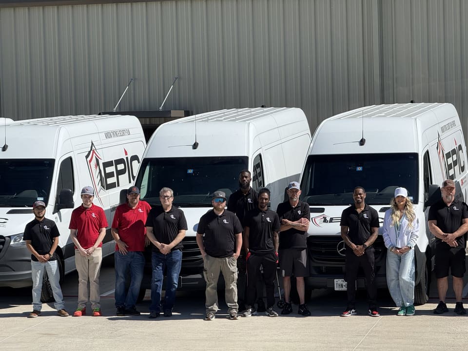 Epic’s installation crew in Epic uniforms with the Certified Expert badge