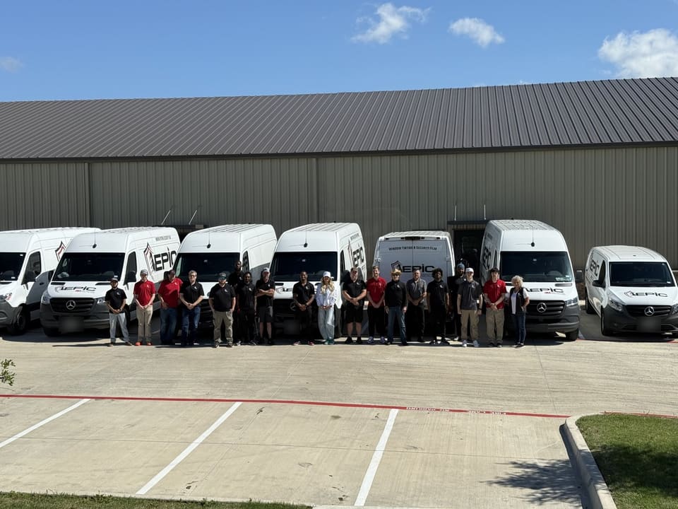 Epic crew lined up in front of the fleet at headquarters