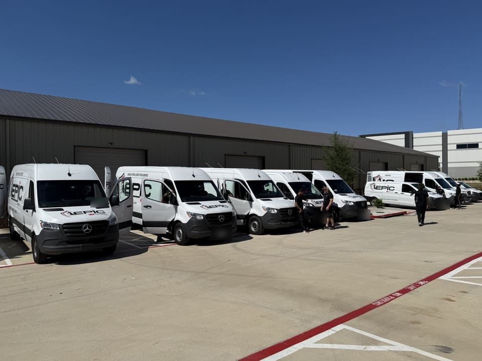 Epic vans in a row at the McKinney shop